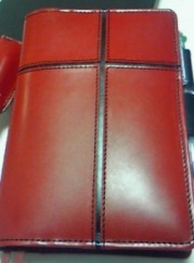赤いヌメ革の手帳カバー